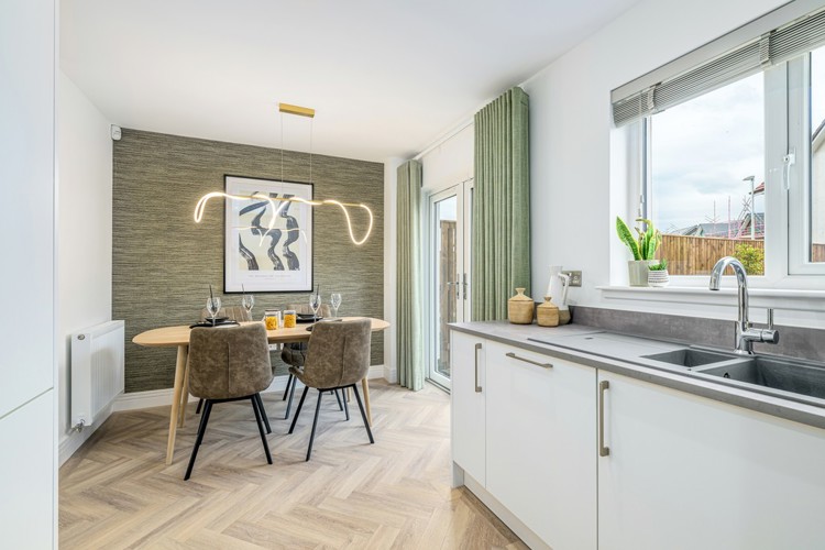 3 bedroom showhome | open plan kitchen, dining and family area with French doors to rear garden