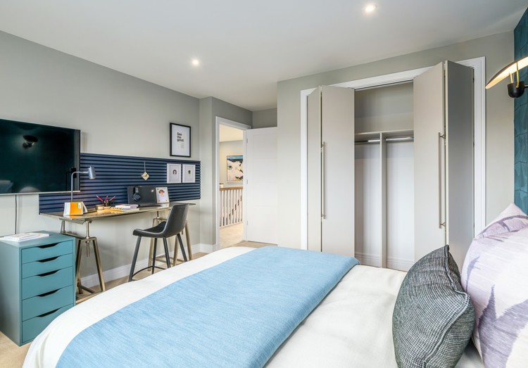 5 bedroom showhome | bedroom with fitted wardrobes and stand-out decor