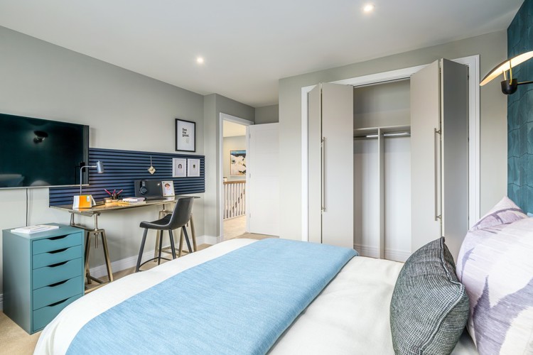 5 bedroom showhome | bedroom with fitted wardrobes and stand-out decor