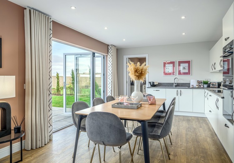 4 bedroom showhome | open plan kitchen, dining and family area with bi-fold doors to rear garden