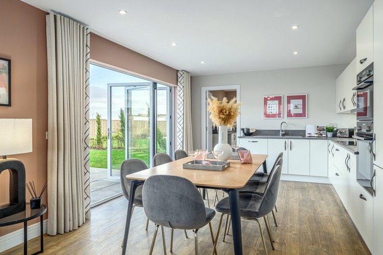 4 bedroom showhome | open plan kitchen, dining and family area with bi-fold doors to rear garden