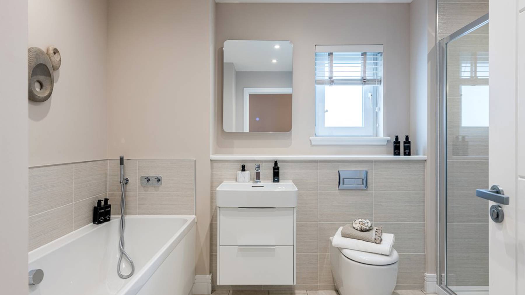 4 bedroom showhome | high-spec family bathroom with separate bath and walk-in shower