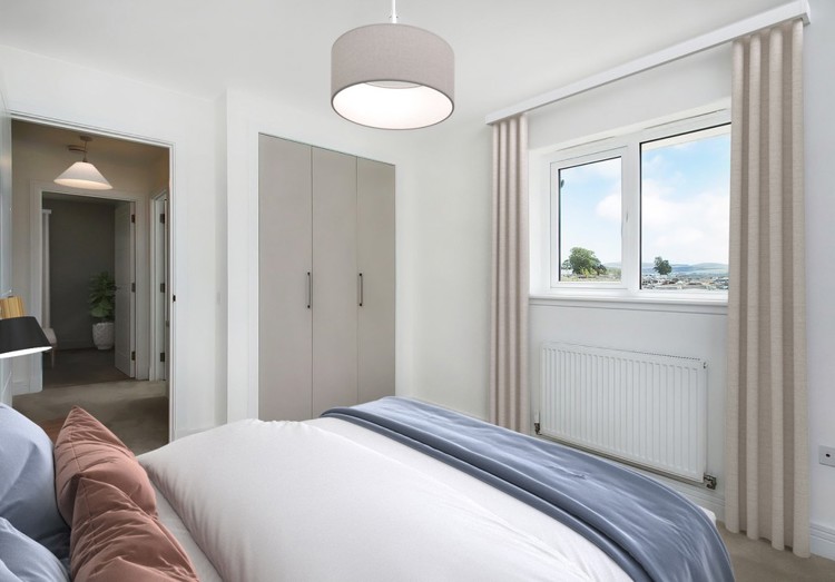 3 bedroom showhome | second bedroom with built-in storage and soft neutral tones