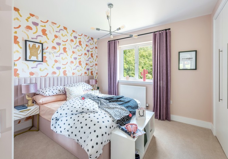 5 bedroom showhome | generous bedroom with built-in storage and soft neutral décor