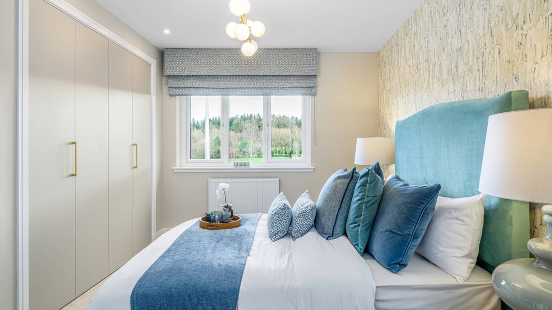 4 bedroom plus study showhome | bedroom with built-in storage and soft neutral tones