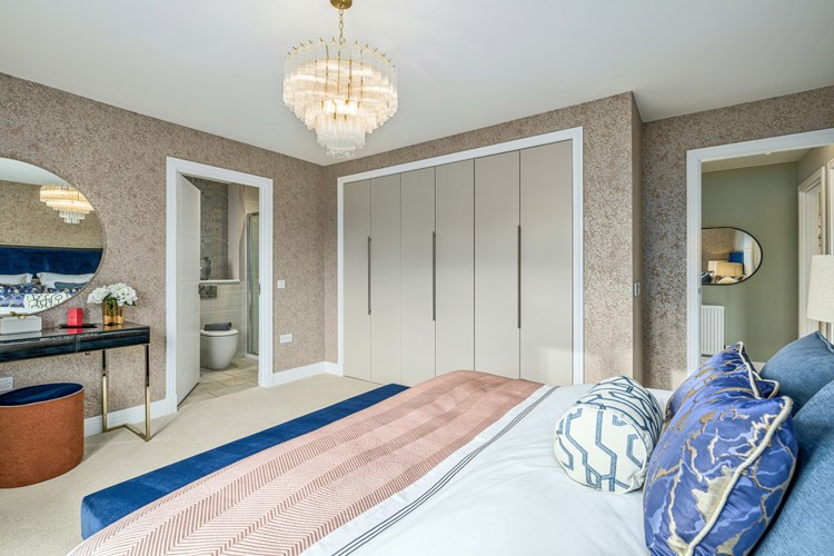 4 bedroom showhome | principal bedroom with en suite and fitted wardrobes with bi-fold doors