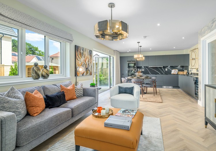 5 bedroom showhome | impressive high spec kitchen, dining and lounge area with bi-fold doors to the garden