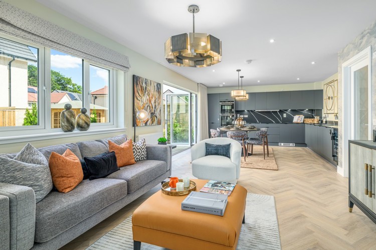 5 bedroom showhome | impressive high spec kitchen, dining and lounge area with bi-fold doors to the garden
