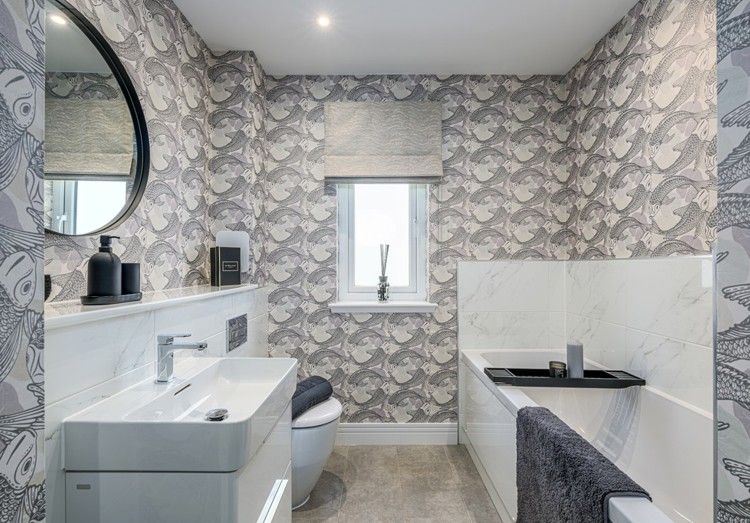 4 bedroom plus study showhome | stylish family bathroom with sleek fittings and half-height tiling