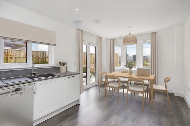 3 bedroom showhome | open plan kitchen and dining area with French doors to rear garden