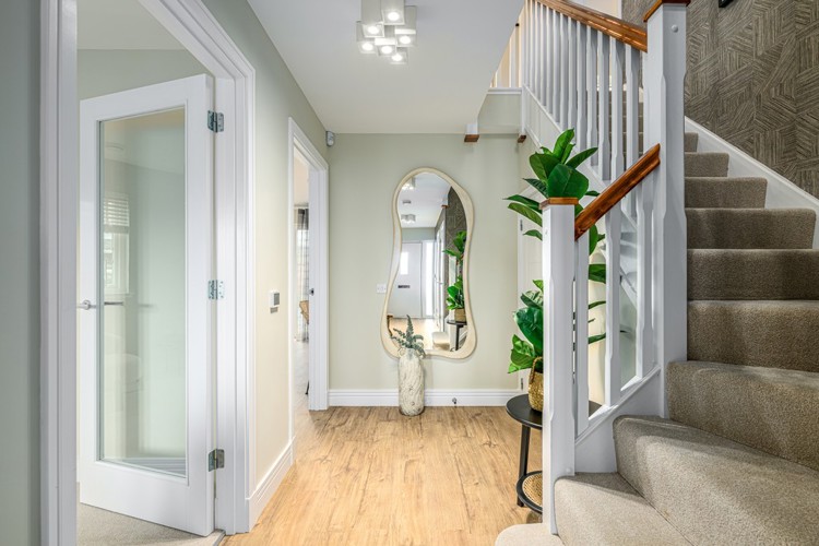 4 bedroom showhome | downstairs hallway with spacious feel
