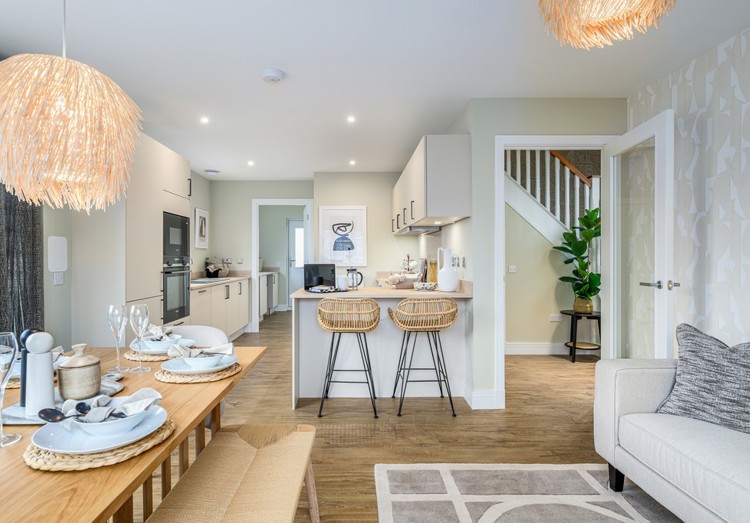4 bedroom showhome | open plan studio-style kitchen, dining and family area with bi-fold doors to rear garden