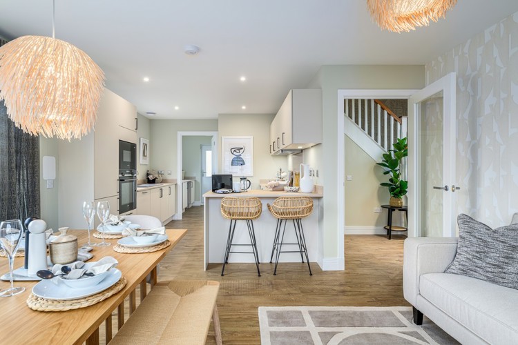 4 bedroom showhome | open plan studio-style kitchen, dining and family area with bi-fold doors to rear garden