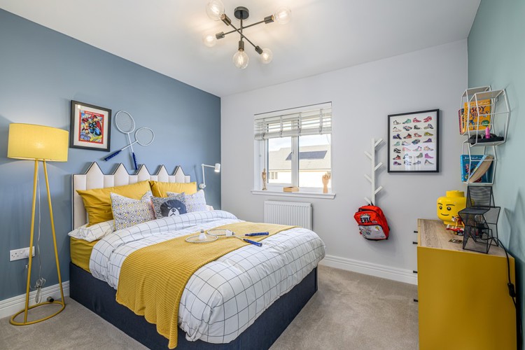 5 bedroom showhome | bedroom with fitted wardrobes and homely décor