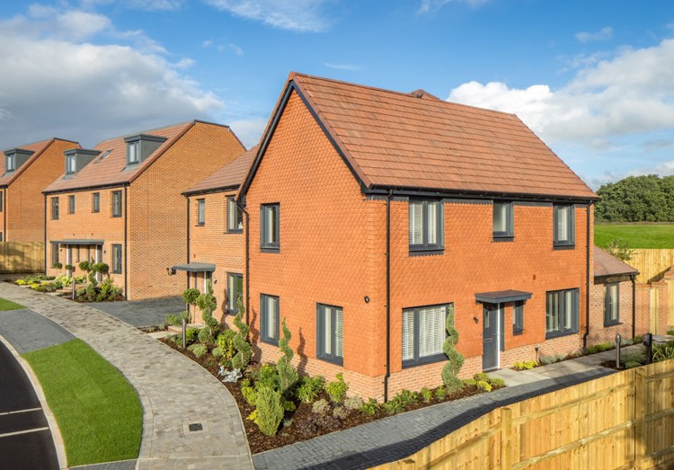 Street scene of new build houses for sale in Deepcut