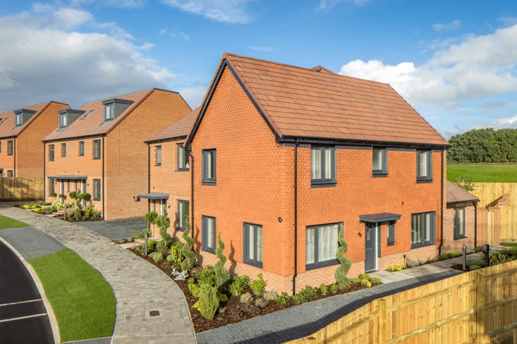 Street scene of new build houses for sale in Deepcut