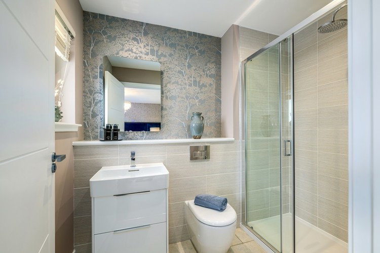 4 bedroom showhome | sleek en suites with chrome fittings and full-height tiling