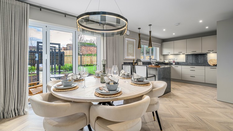 4 bedroom plus study showhome | open plan kitchen, dining area with bi-fold doors to the rear garden and patio