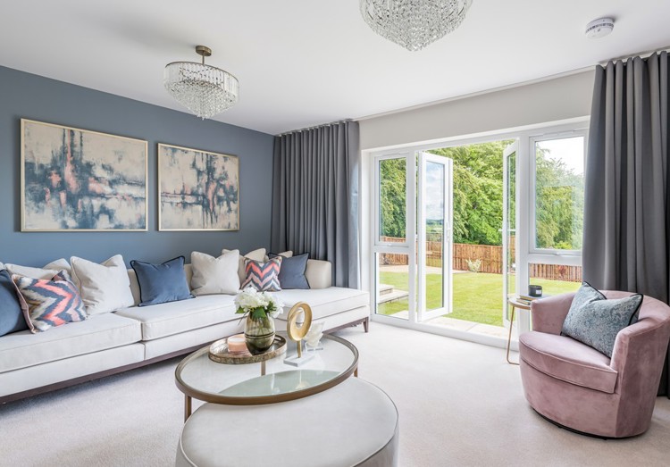 5 bedroom showhome | formal lounge with French doors to rear garden