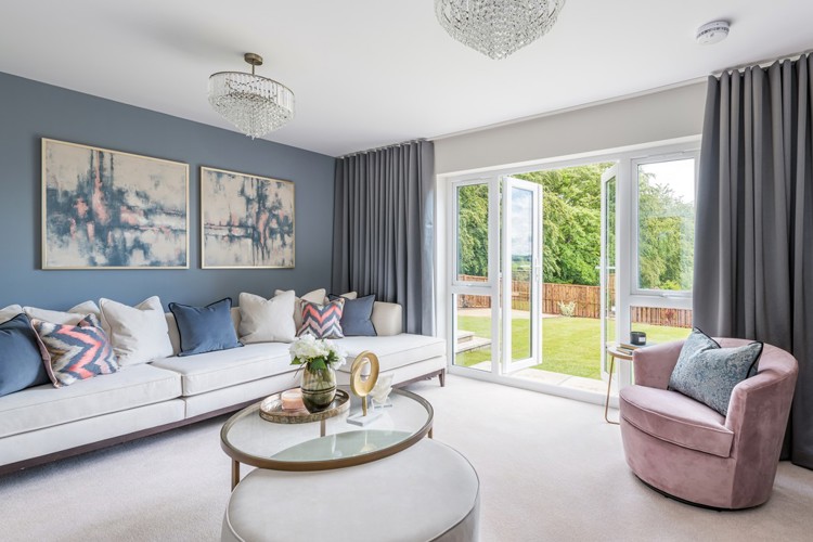 5 bedroom showhome | formal lounge with French doors to rear garden