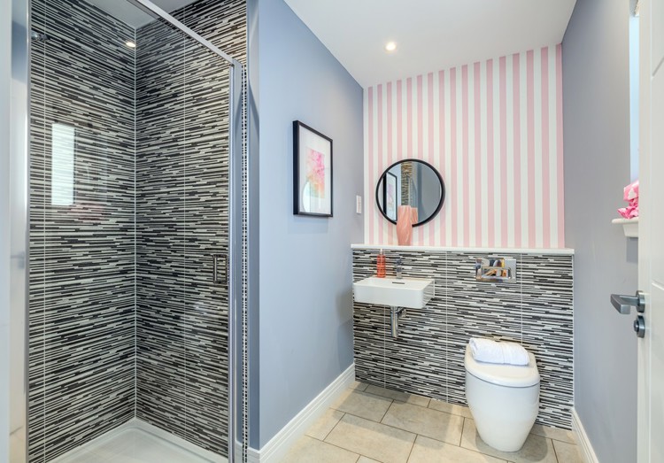 4 bedroom showhome | sleek en suites with chrome fittings and full-height tiling