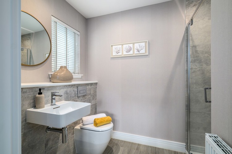 5 bedroom showhome | stylish en suites with chrome fittings and full-height tiling