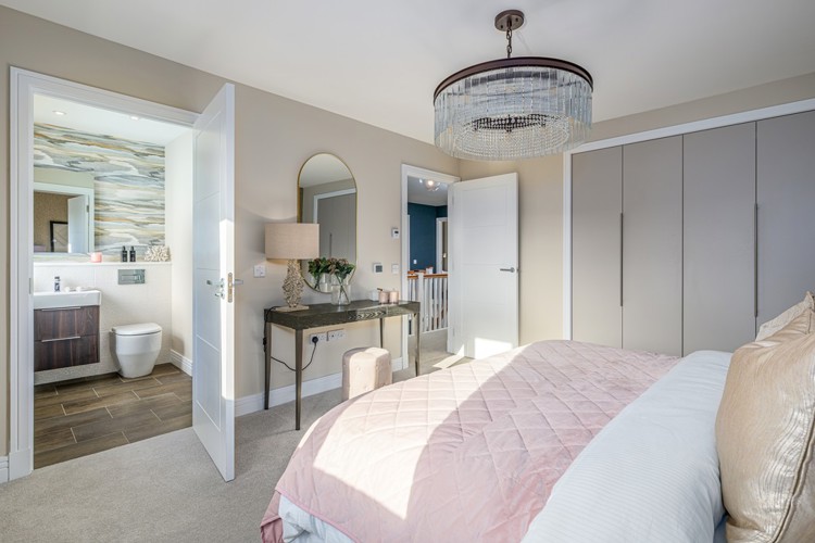 5 bedroom showhome | principal bedroom with double fitted wardrobes and en suite