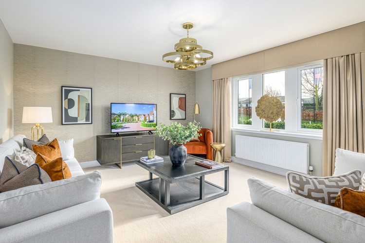 4 bedroom showhome | spacious formal lounge with large front-facing windows and elegant décor