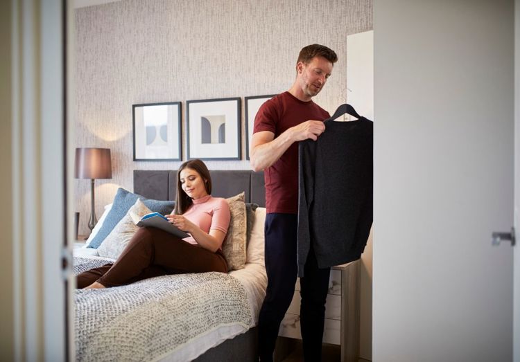 Lifestyle | Couple Smiling in Bedroom