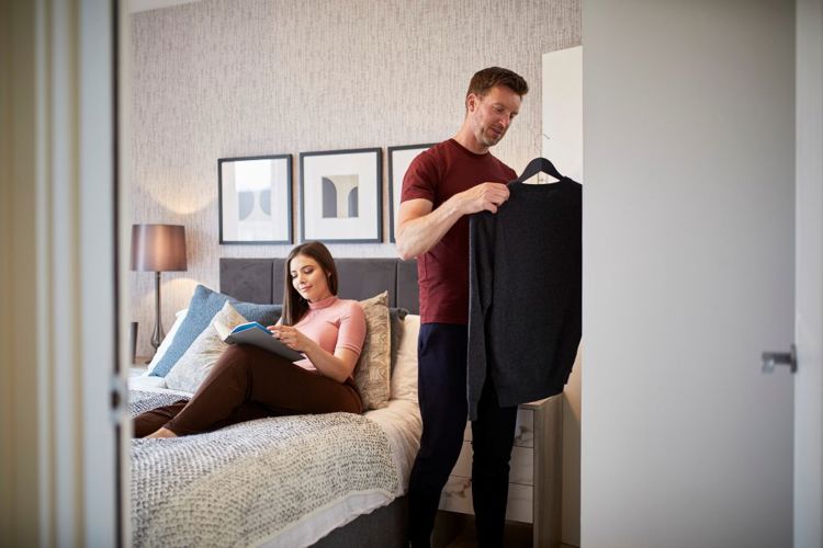 Lifestyle | Couple Smiling in Bedroom