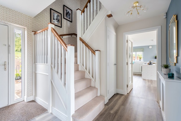 5 bedroom showhome | welcoming hallway with cloakroom and access to lounge and kitchen
