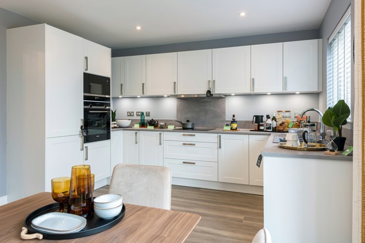 4 bedroom showhome | Open plan high spec kitchen and dining area with bi-fold doors to the garden