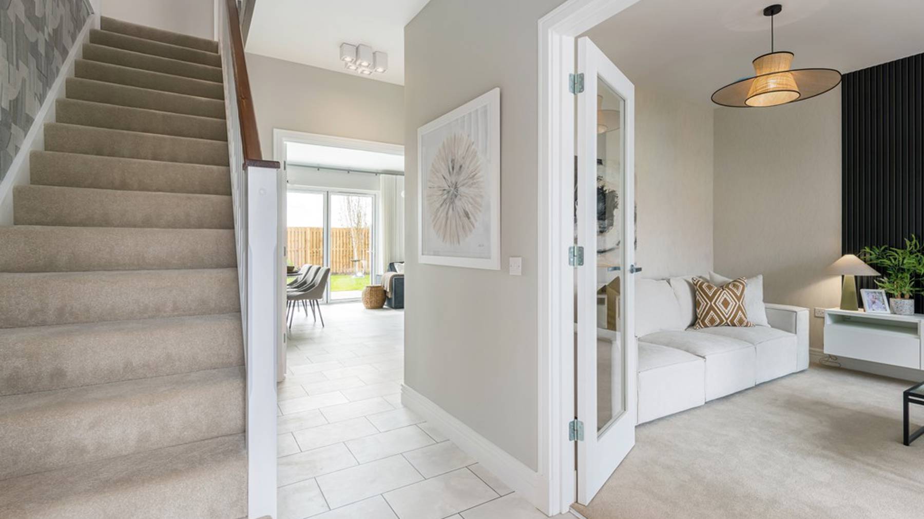 5 bedroom showhome | spacious entrance hallway with cloakroom and access to lounge and kitchen