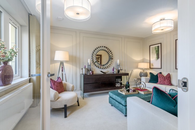 4 bedroom showhome | formal lounge with front-facing windows and elegant neutral décor