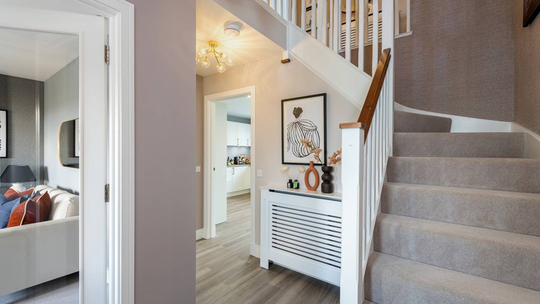 4 bedroom showhome | Open plan high spec kitchen and dining area with bi-fold doors to the garden