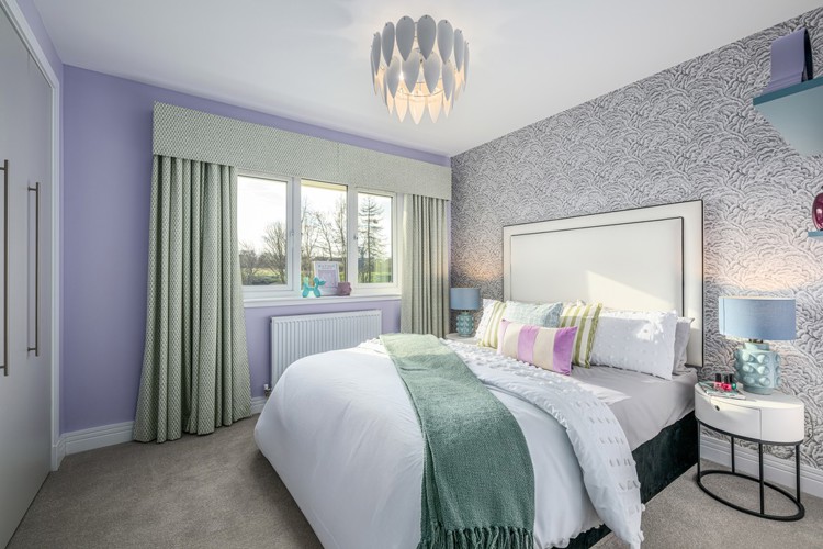5 bedroom showhome | bedroom with fitted wardrobes and homely décor