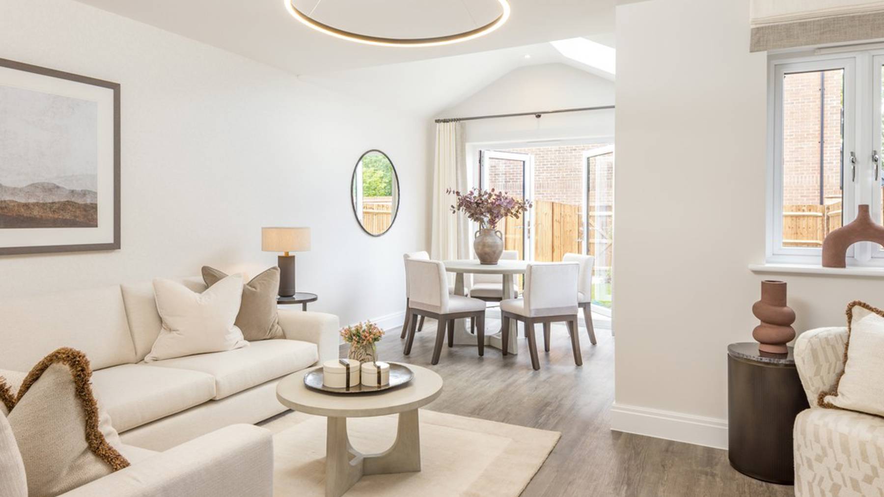 Open plan living room in houses for sale in Egham Surrey