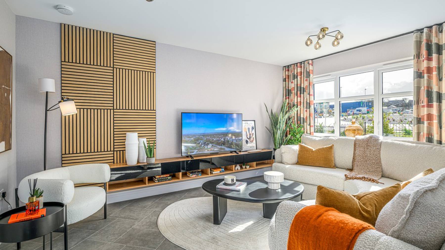 Bryce house type bright and spacious lounge with media unit